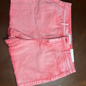 Women’s peachy colored denim shorts size 16